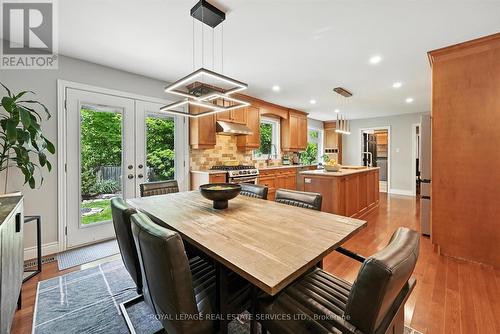 Enjoy Effortless Indoor-Outdoor Living - 4240 Dunvegan Road, Burlington, ON - Indoor Photo Showing Dining Room