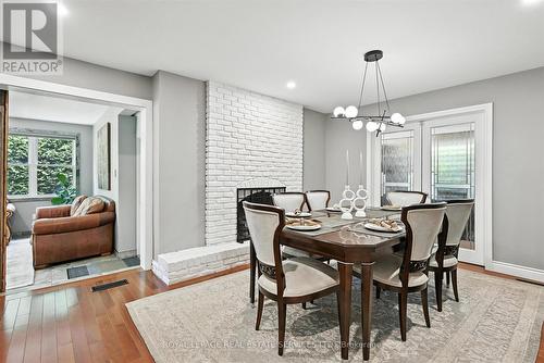 Formal Dining Room with Woodburning Fireplace - 4240 Dunvegan Road, Burlington, ON - Indoor Photo Showing Dining Room