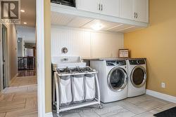 Main Floor Renovated Laundry Room - 