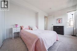 Bedroom with carpet and baseboards - 