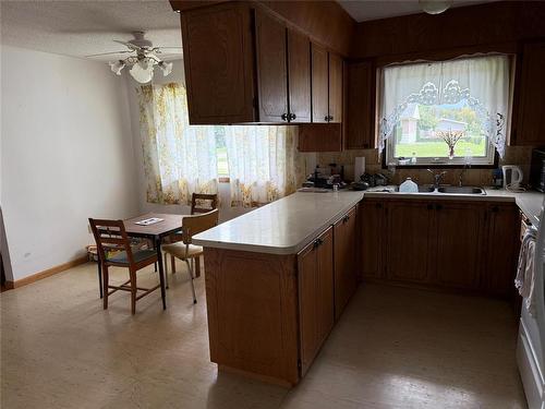 169 3Rd Avenue E, Benito, MB - Indoor Photo Showing Kitchen With Double Sink