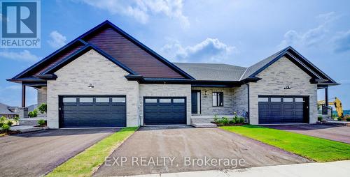91 Bedell Drive, Mapleton, ON - Outdoor With Facade