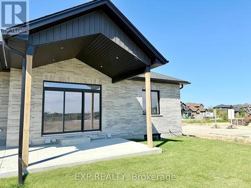 91 Bedell Drive, Mapleton, ON - Outdoor With Exterior