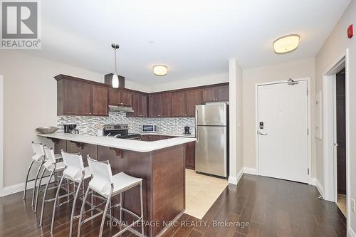 Fully stocked kitchen essentials! - 304 - 26 Wellington Street, St. Catharines (Downtown), ON - Indoor Photo Showing Kitchen With Stainless Steel Kitchen