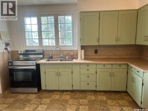 1402 2Nd Street, Estevan, SK - Indoor Photo Showing Kitchen With Double Sink