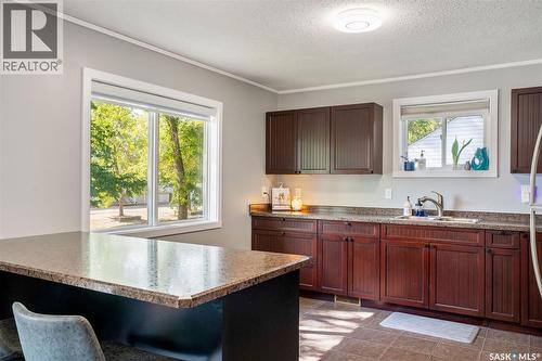 813 98Th Avenue, Tisdale, SK - Indoor Photo Showing Kitchen With Double Sink