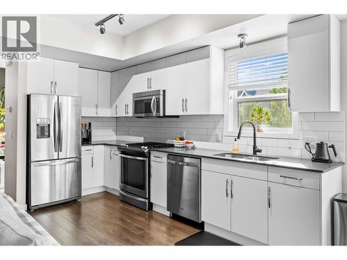 680 Old Meadows Road Unit# 1, Kelowna, BC - Indoor Photo Showing Kitchen With Double Sink With Upgraded Kitchen