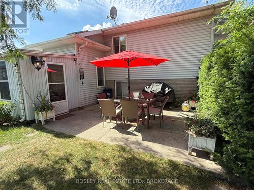 Private side yard with use of barbecue - 972 Line 3 Road, Niagara-On-The-Lake (Virgil), ON - Outdoor With Exterior