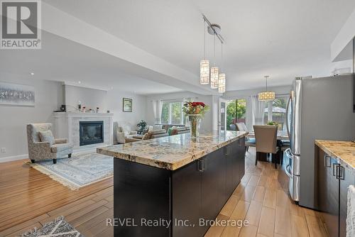 6558 Montrose Road, Niagara Falls (West Wood), ON - Indoor Photo Showing Kitchen With Fireplace With Upgraded Kitchen