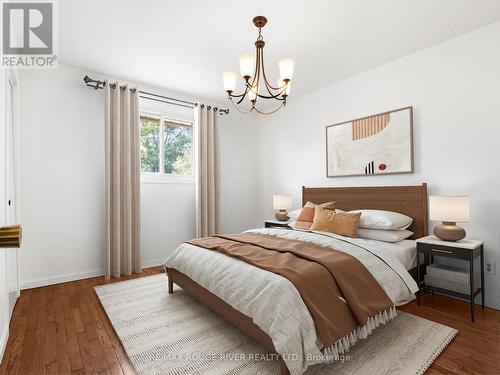 VIRTUALLY STAGED PHOTOGRAPHIC RENDERING - 815 Westwood Drive, Cobourg, ON - Indoor Photo Showing Bedroom