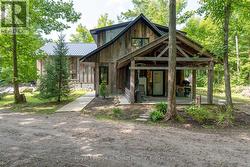 Covered porch entry to apartment - 