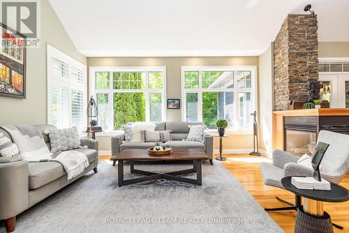 19 Turtle Point Private, Ottawa, ON - Indoor Photo Showing Living Room With Fireplace