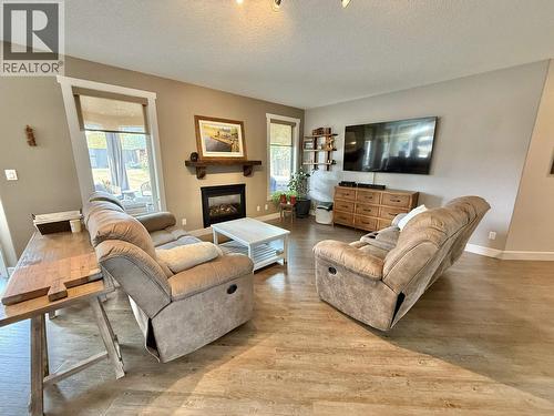 2196 Gassoff Road, Quesnel, BC - Indoor Photo Showing Living Room With Fireplace