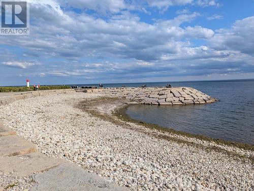 SCENIC WALKWAYS BY THE LAKE! - 105 - 20 Speers Road, Oakville (Co Central), ON - Outdoor With Body Of Water With View