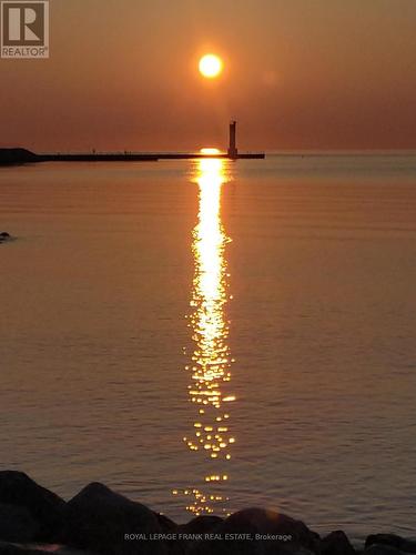 EARLY MORNING OAKVILLE LAKEFRONT! - 105 - 20 Speers Road, Oakville (Co Central), ON - Outdoor With Body Of Water With View