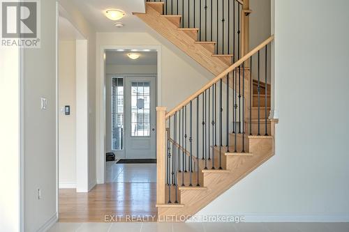 oak staircase - 61 Golden Meadows Drive, Otonabee-South Monaghan, ON - Indoor Photo Showing Other Room