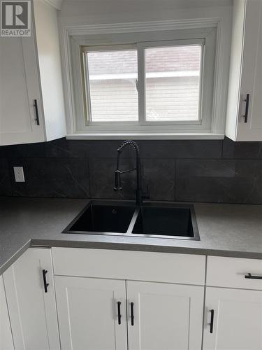 35 Wallace Ter, Sault Ste. Marie, ON - Indoor Photo Showing Kitchen With Double Sink