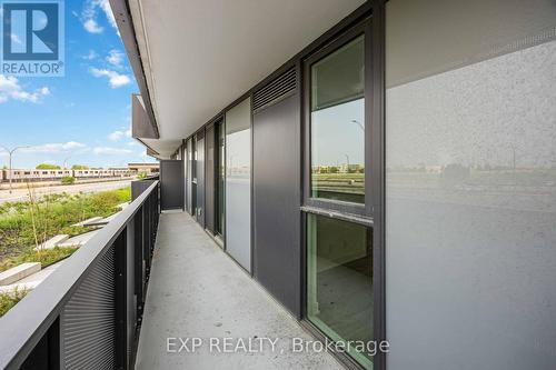 219 - 30 Tretti Way, Toronto, ON - Outdoor With Balcony With Exterior