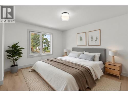 Primary bedroom is virtually staged - 2345 Patterson Avenue Unit# 102, Armstrong, BC - Indoor Photo Showing Bedroom