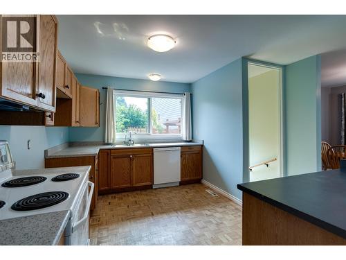 1257 And 1259 Rio Drive, Kelowna, BC - Indoor Photo Showing Kitchen