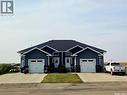 1-4 316 3Rd Street W, Delisle, SK  - Outdoor With Facade 