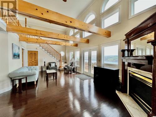 29-33 Motion Drive, Torbay, NL - Indoor With Fireplace