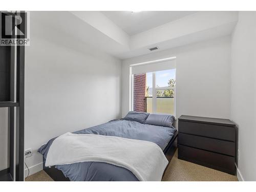 985 Academy Way Unit# 104, Kelowna, BC - Indoor Photo Showing Bedroom