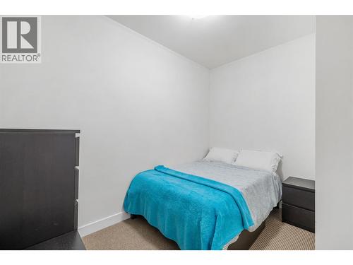 985 Academy Way Unit# 104, Kelowna, BC - Indoor Photo Showing Bedroom