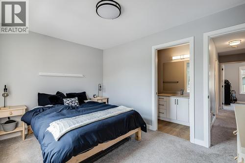 1435 Cara Glen Court Unit# 101, Kelowna, BC - Indoor Photo Showing Bedroom