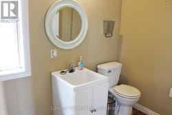 Main level washroom and laundry - 