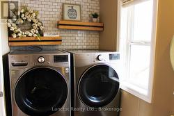 Main level washroom and laundry - 