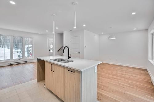 Cuisine - 15B Ch. Crouch, Val-Des-Monts, QC - Indoor Photo Showing Kitchen With Double Sink