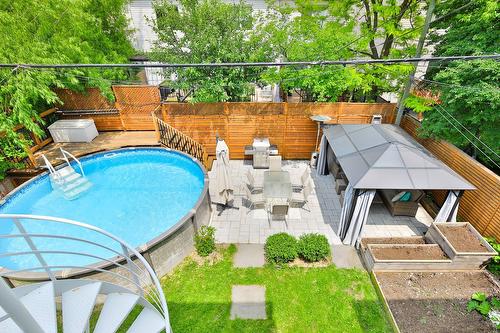 Backyard - 4413 Av. D'Orléans, Montréal (Rosemont/La Petite-Patrie), QC - Outdoor With Above Ground Pool