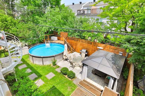 Backyard - 4413 Av. D'Orléans, Montréal (Rosemont/La Petite-Patrie), QC - Outdoor With Above Ground Pool