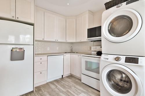 Kitchen - 4413 Av. D'Orléans, Montréal (Rosemont/La Petite-Patrie), QC - Indoor Photo Showing Laundry Room