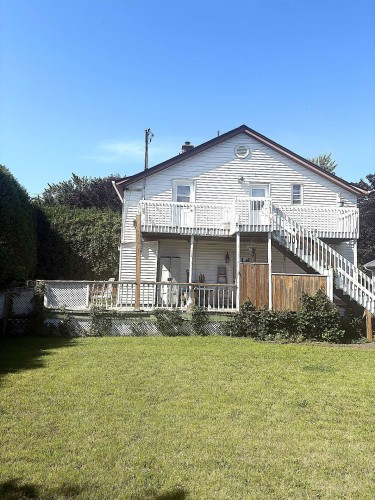 Back of Structure - 203  - 207 Boul. Neptune, Dorval, QC - Outdoor With Deck Patio Veranda