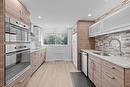 Cuisine - 405-4911 Ch. De La Côte-Des-Neiges, Montréal (Côte-Des-Neiges/Notre-Dame-De-Grâce), QC  - Indoor Photo Showing Kitchen With Upgraded Kitchen 