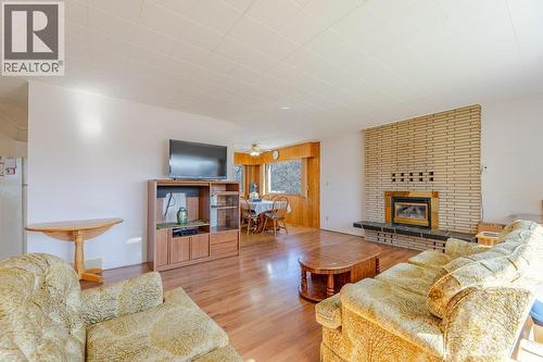 9108 74Th Avenue, Osoyoos, BC - Indoor Photo Showing Living Room With Fireplace