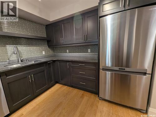 204 921 Main Street, Saskatoon, SK - Indoor Photo Showing Kitchen With Double Sink