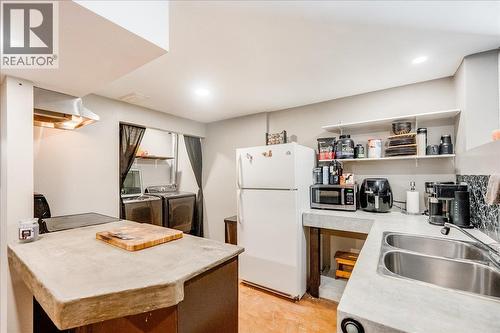 1056 Clarke Road, Castlegar, BC - Indoor Photo Showing Kitchen With Double Sink