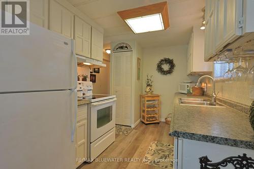 208 Biltmore Drive, South Huron (Stephen), ON - Indoor Photo Showing Kitchen With Double Sink