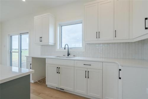 59 Woodland Drive, Steinbach, MB - Indoor Photo Showing Kitchen