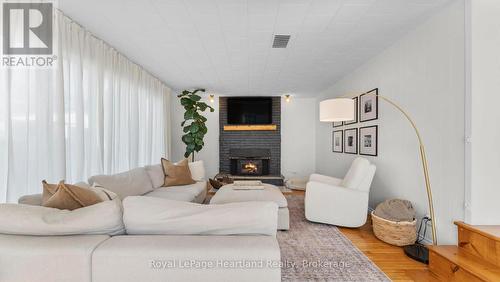 5 William Drive, South Huron (Stephen), ON - Indoor Photo Showing Living Room With Fireplace