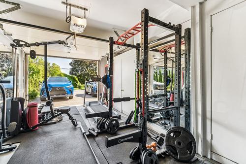 Garage - 3125 Rue Cherrier, Montréal (L'Île-Bizard/Sainte-Geneviève), QC - Indoor Photo Showing Gym Room