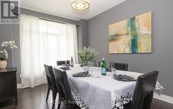 Dining Room with Large Picture Window - 