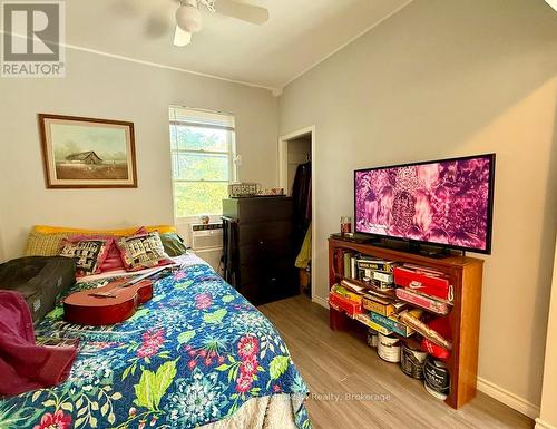 Airy studio bedroom in upper unit. - 4 Duncan Street E, Huntsville (Chaffey), ON - Indoor Photo Showing Bedroom