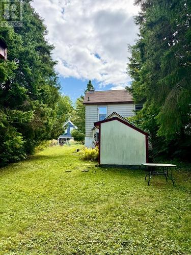 Gentle slope in back, leads to lower unit entry. - 4 Duncan Street E, Huntsville (Chaffey), ON - Outdoor
