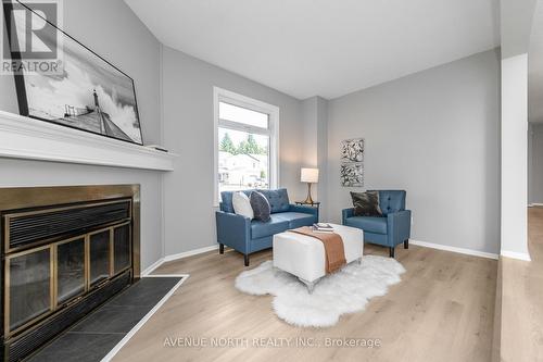 2 Chickasaw Crescent, Ottawa, ON - Indoor Photo Showing Living Room With Fireplace
