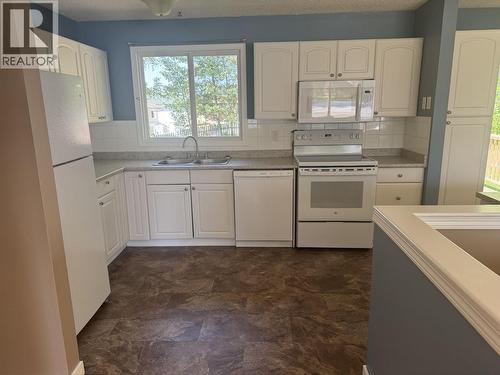 417 Centennial Drive, Mackenzie, BC - Indoor Photo Showing Kitchen With Double Sink
