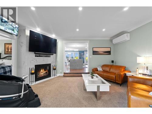 4911 Malpass Road, Armstrong, BC - Indoor Photo Showing Living Room With Fireplace